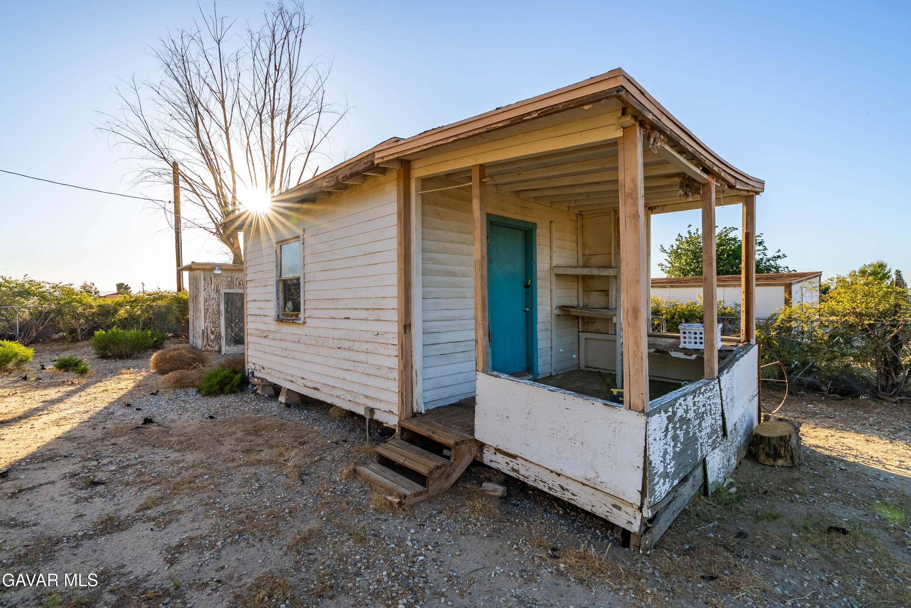 20539 East Ave R Palmdale, CA 93591 - Photo 37 of 55 a view of a house with a yard