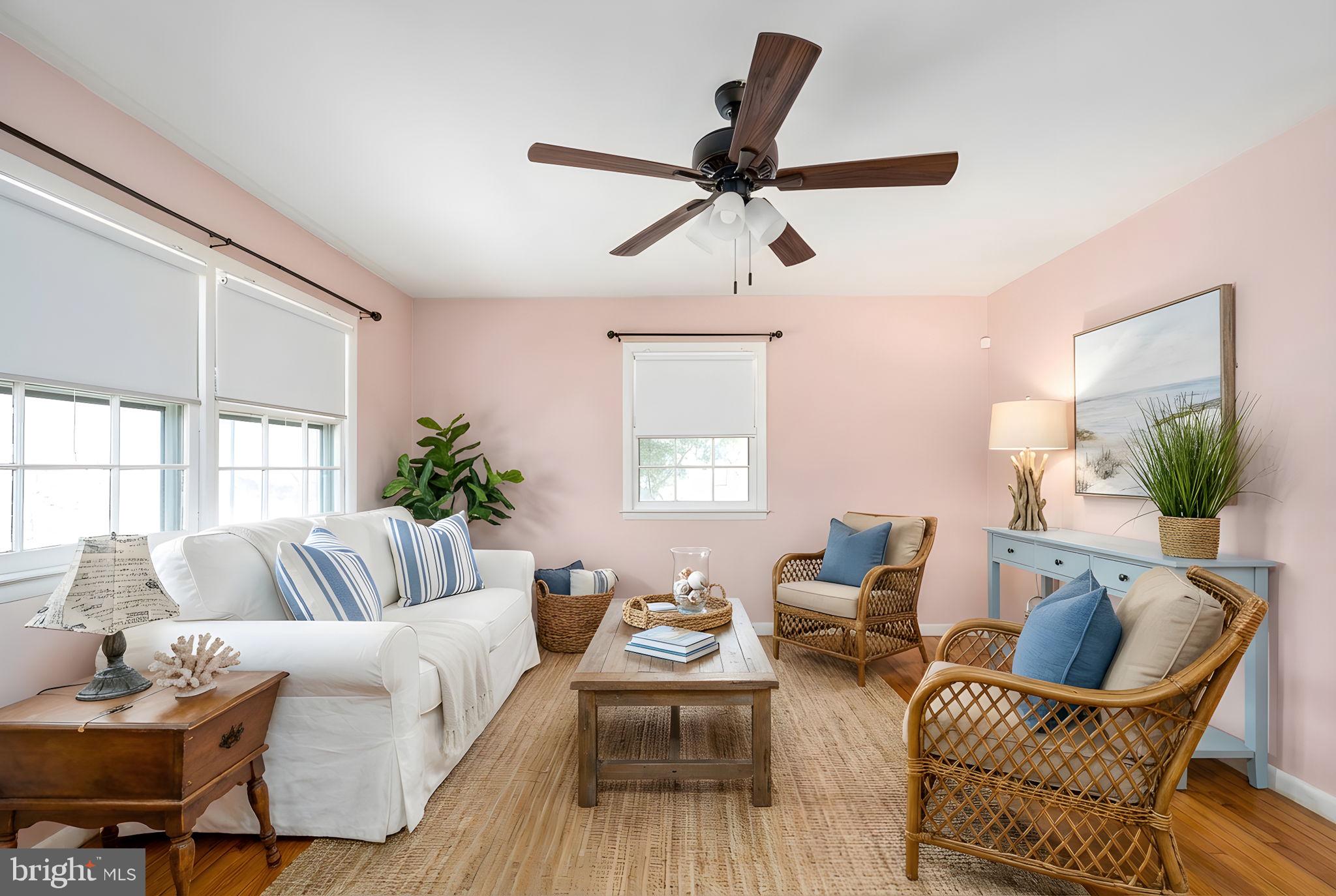128 11th Street Colonial Beach, VA 22443 - Photo 17 of 80 a living room with furniture and a large window