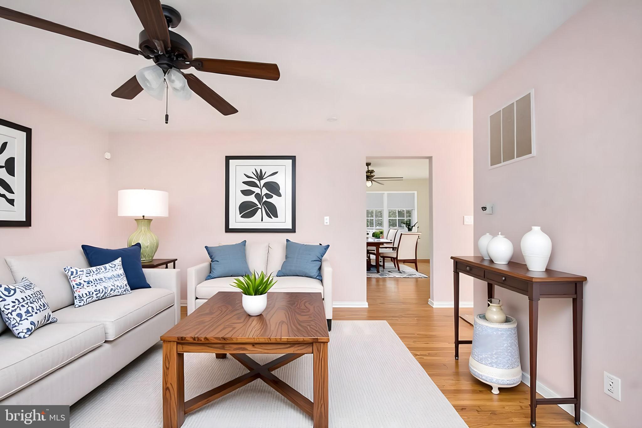 128 11th Street Colonial Beach, VA 22443 - Photo 20 of 80 a living room with furniture and wooden floor
