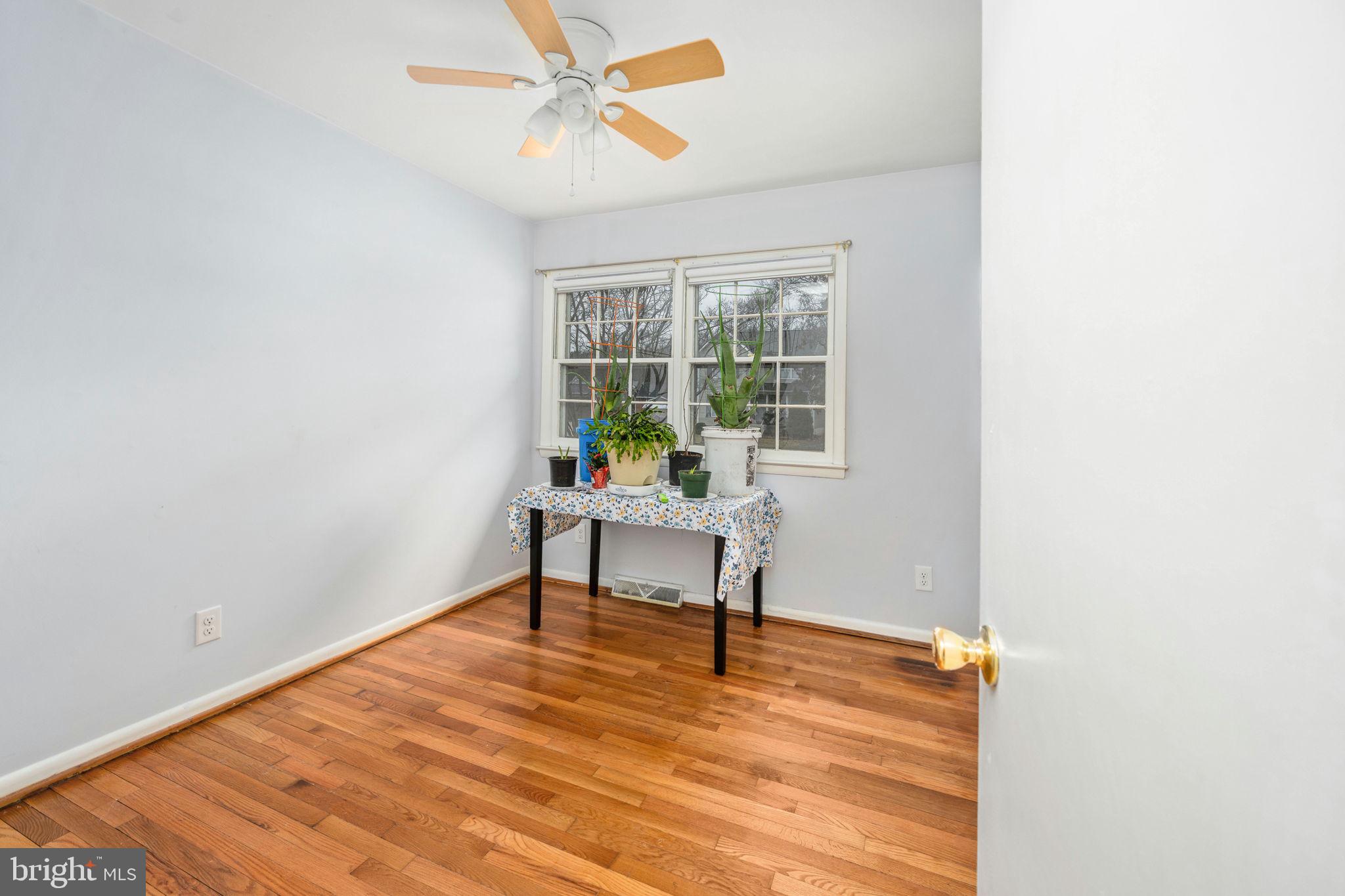 128 11th Street Colonial Beach, VA 22443 - Photo 28 of 58 a view of a workspace with wooden floor