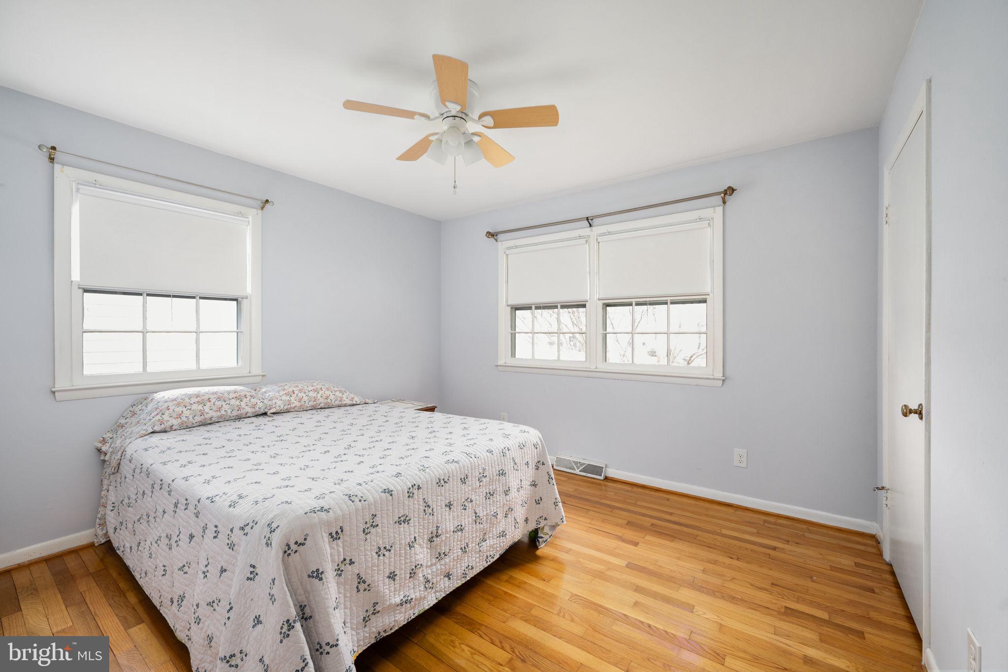 128 11th Street Colonial Beach, VA 22443 - Photo 45 of 80 a bedroom with a bed and window