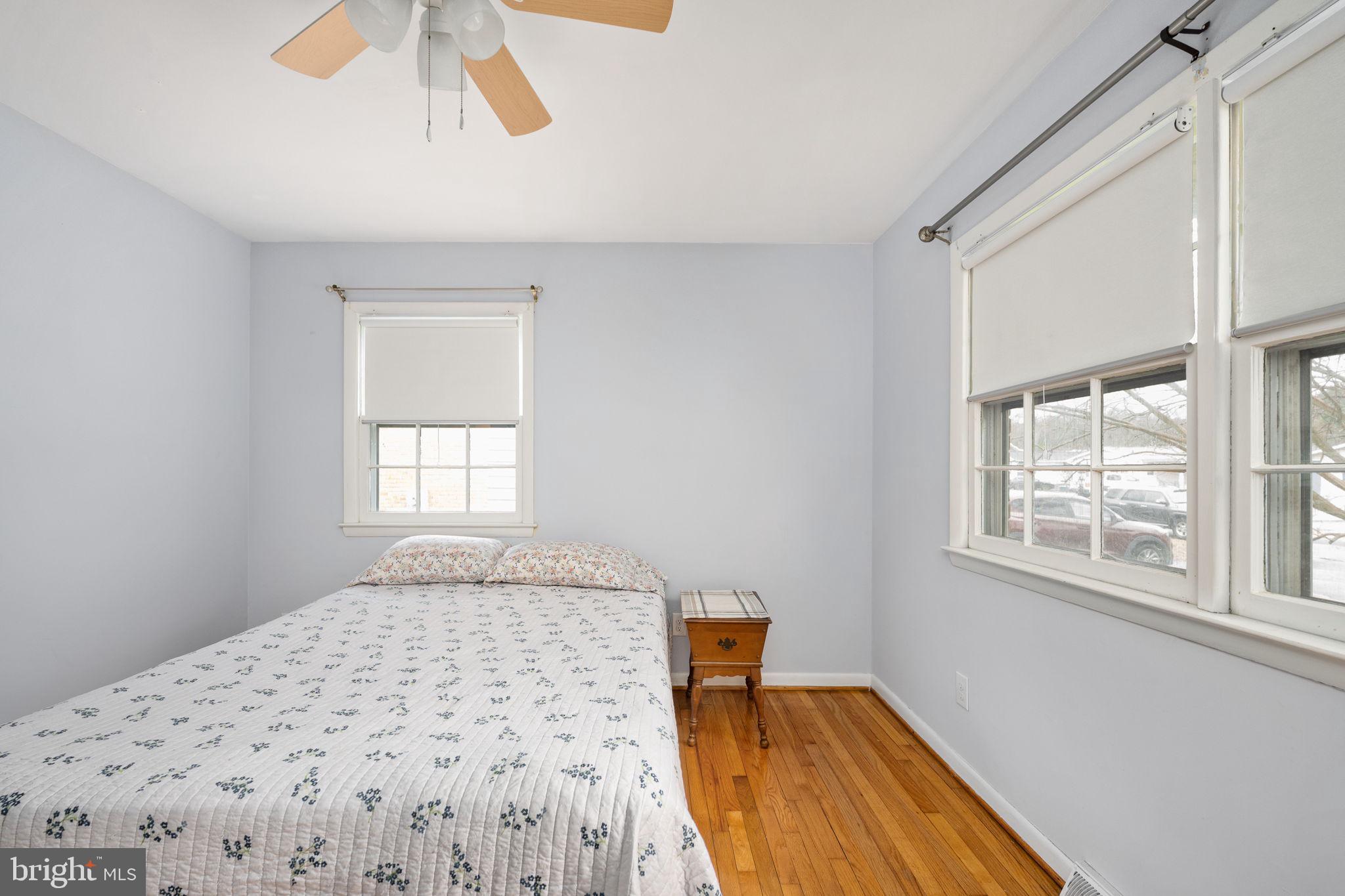 128 11th Street Colonial Beach, VA 22443 - Photo 46 of 80 a bedroom with a bed and a window