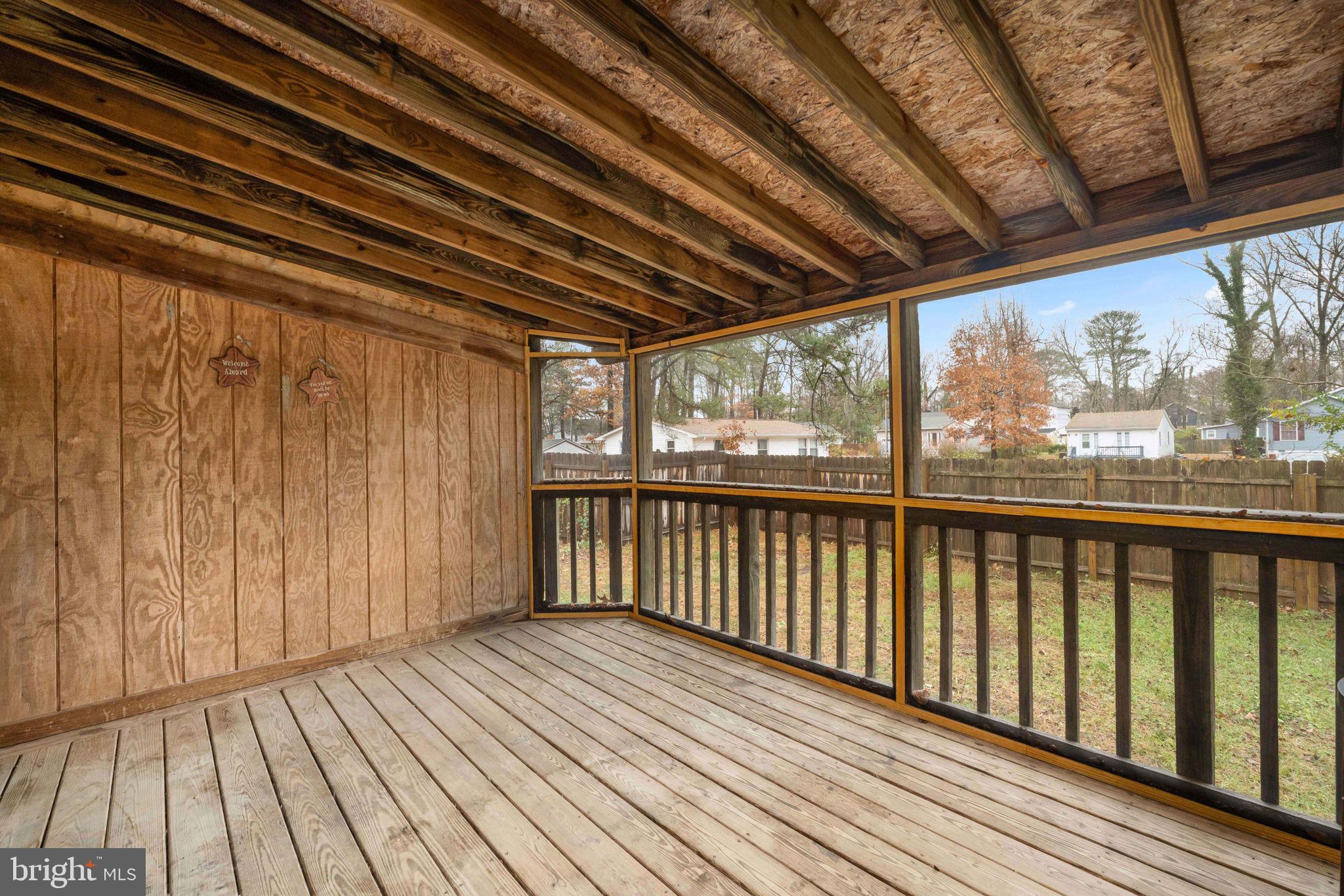 128 11th Street Colonial Beach, VA 22443 - Photo 51 of 80 a view of wooden balcony with wooden floor