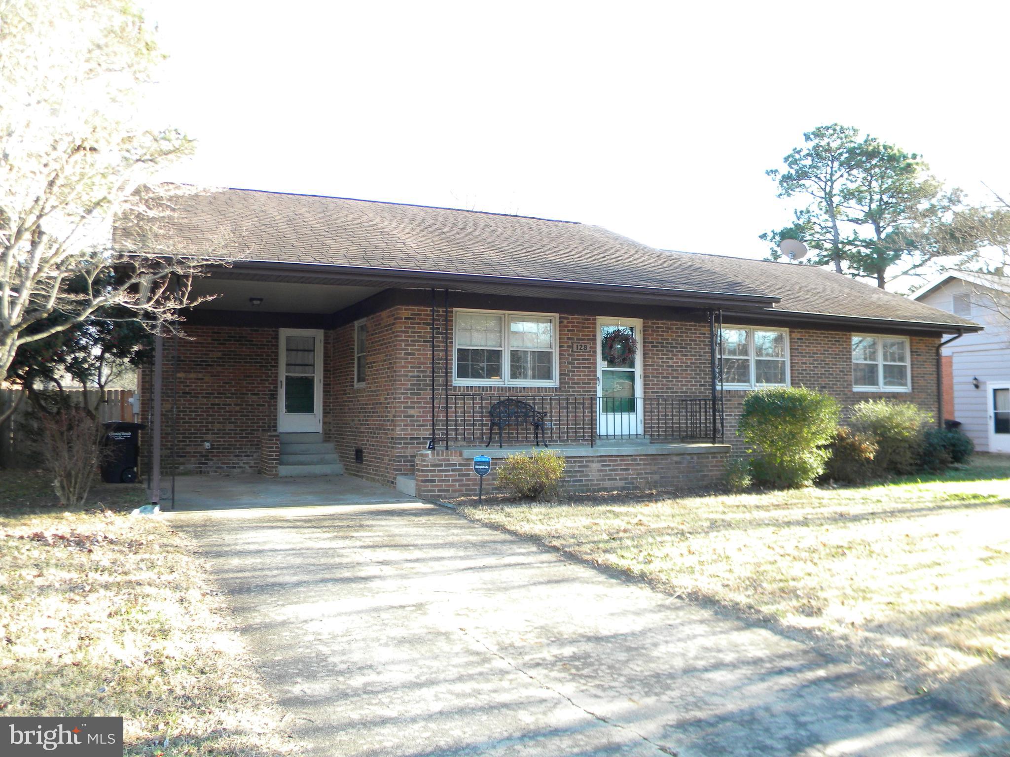 128 11th Street Colonial Beach, VA 22443 - Photo 57 of 80 a view of a house with a patio