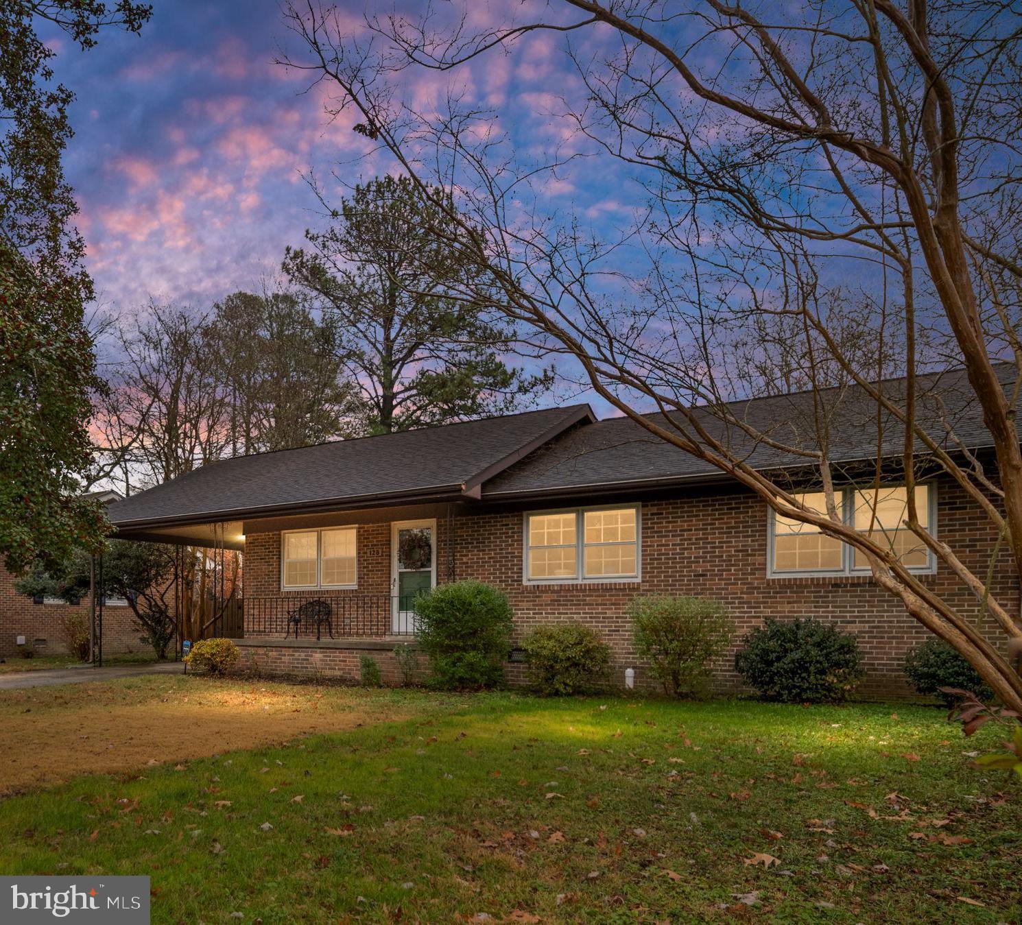 128 11th Street Colonial Beach, VA 22443 - Photo 57 of 58 a front view of a house with garden