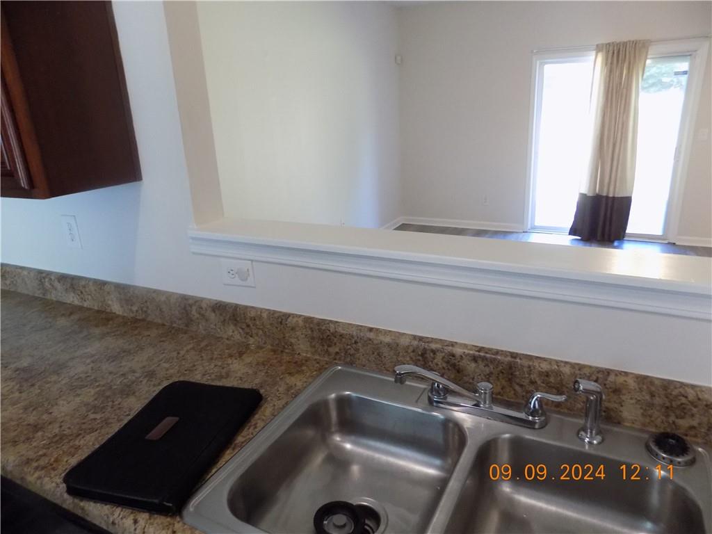 5509 Sable Way Atlanta, GA 30349 - Photo 16 of 37 a close view of sink and tap