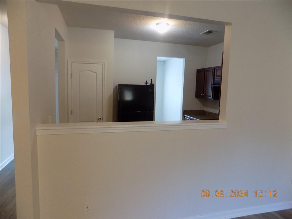 5509 Sable Way Atlanta, GA 30349 - Photo 21 of 37 a view of livingroom with hallway
