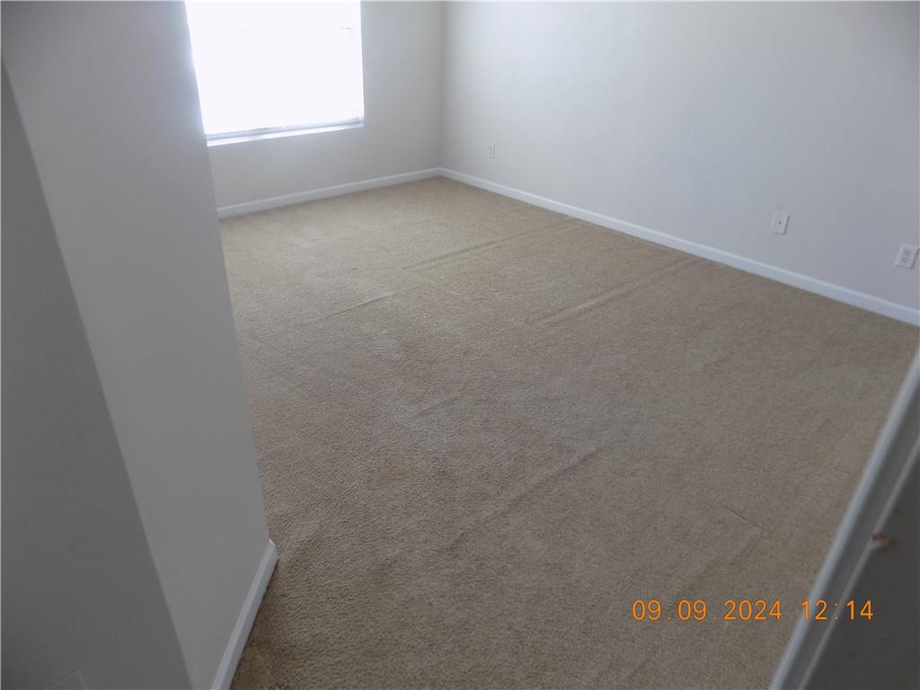 5509 Sable Way Atlanta, GA 30349 - Photo 27 of 37 an empty room with a window