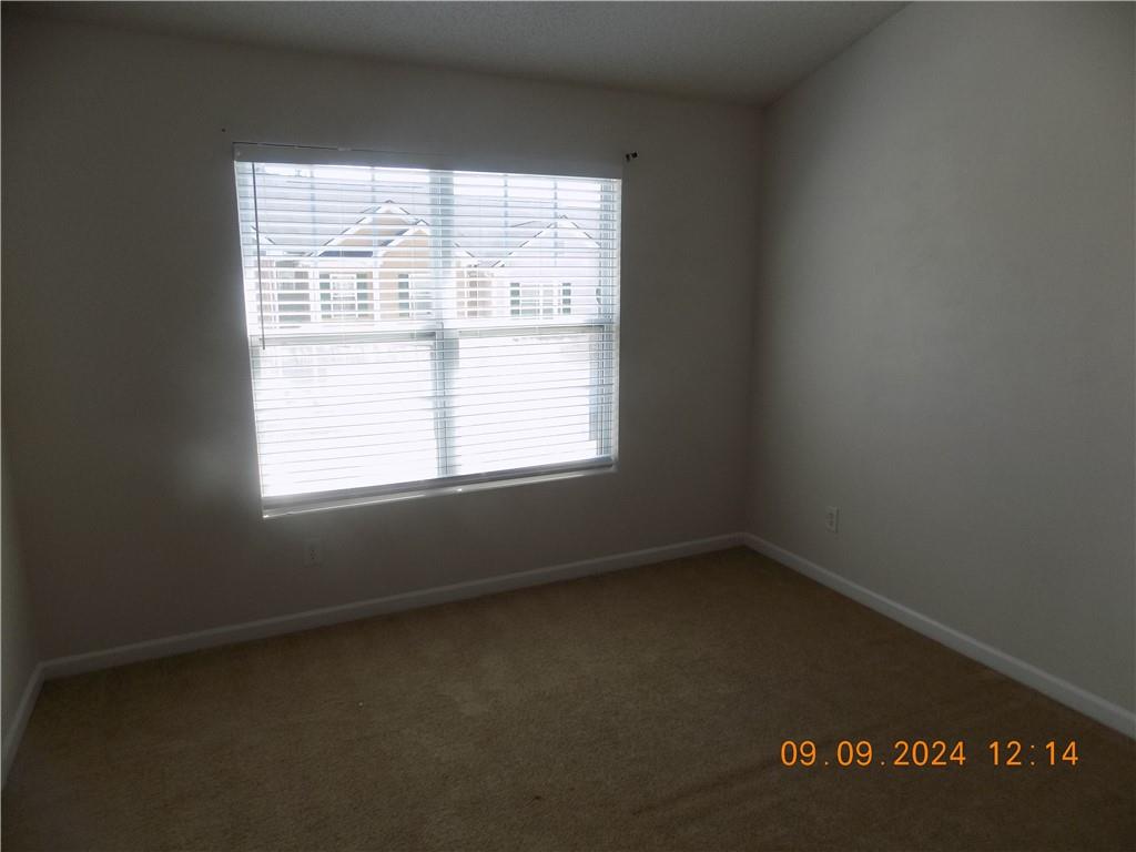 5509 Sable Way Atlanta, GA 30349 - Photo 28 of 37 an empty room with a window