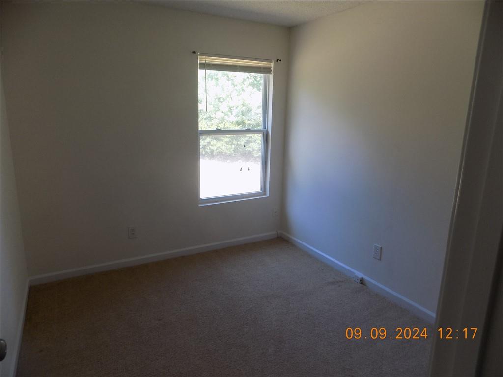 5509 Sable Way Atlanta, GA 30349 - Photo 33 of 37 an empty room with a window