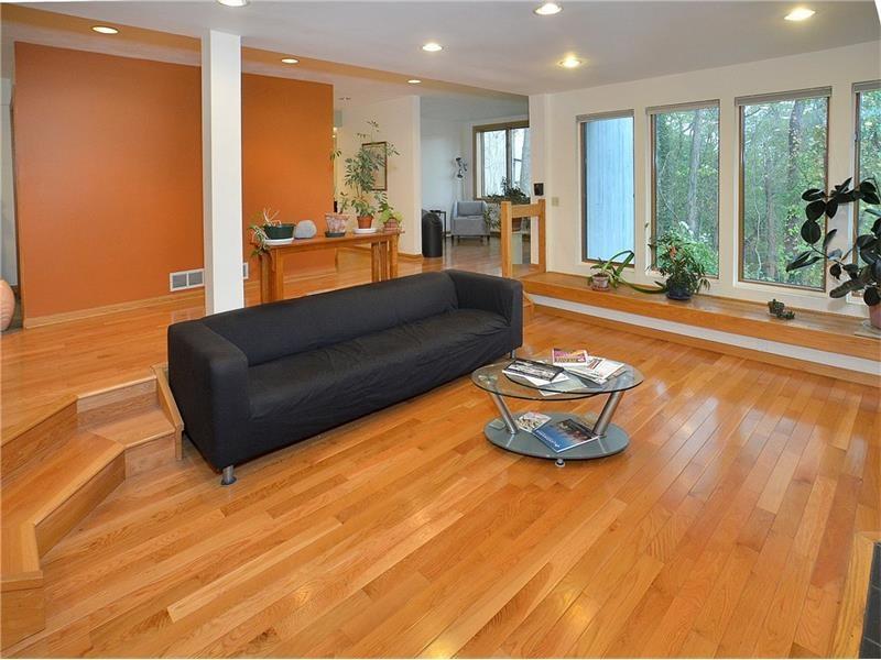 16 Niagara Road Pittsburgh, PA 15221 - Photo 11 of 24 Sunken Living Room Facing TV Room/Office with View of Wooded Back Yard