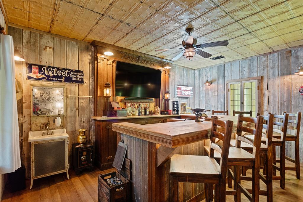 1016 Hells Gate Loop Strawn, TX 76475 - Photo 16 of 31 a view of a dining room with furniture window and wooden floor