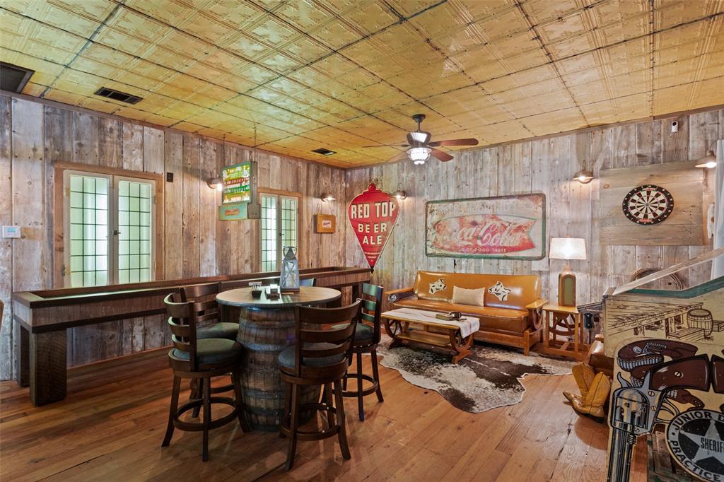1016 Hells Gate Loop Strawn, TX 76475 - Photo 17 of 31 a view of a dining room with furniture window and wooden floor