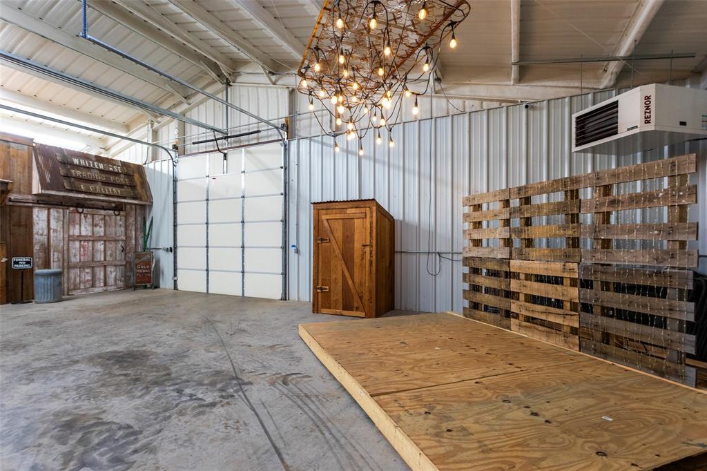 1016 Hells Gate Loop Strawn, TX 76475 - Photo 25 of 31 a view of a garage with furniture
