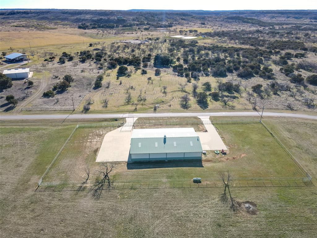1016 Hells Gate Loop Strawn, TX 76475 - Photo 29 of 31 a view of outdoor space and swimming pool