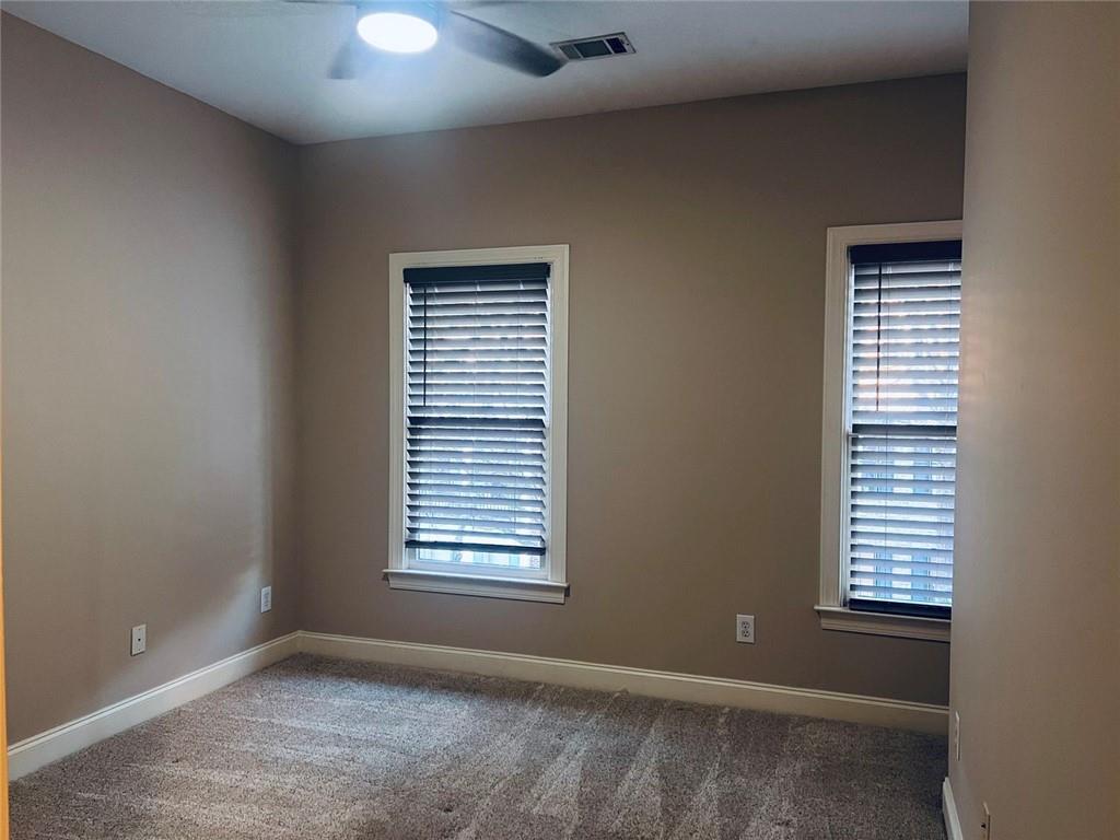 144 West Ridge Way Roswell, GA 30076 - Photo 15 of 30 a view of an empty room with a window