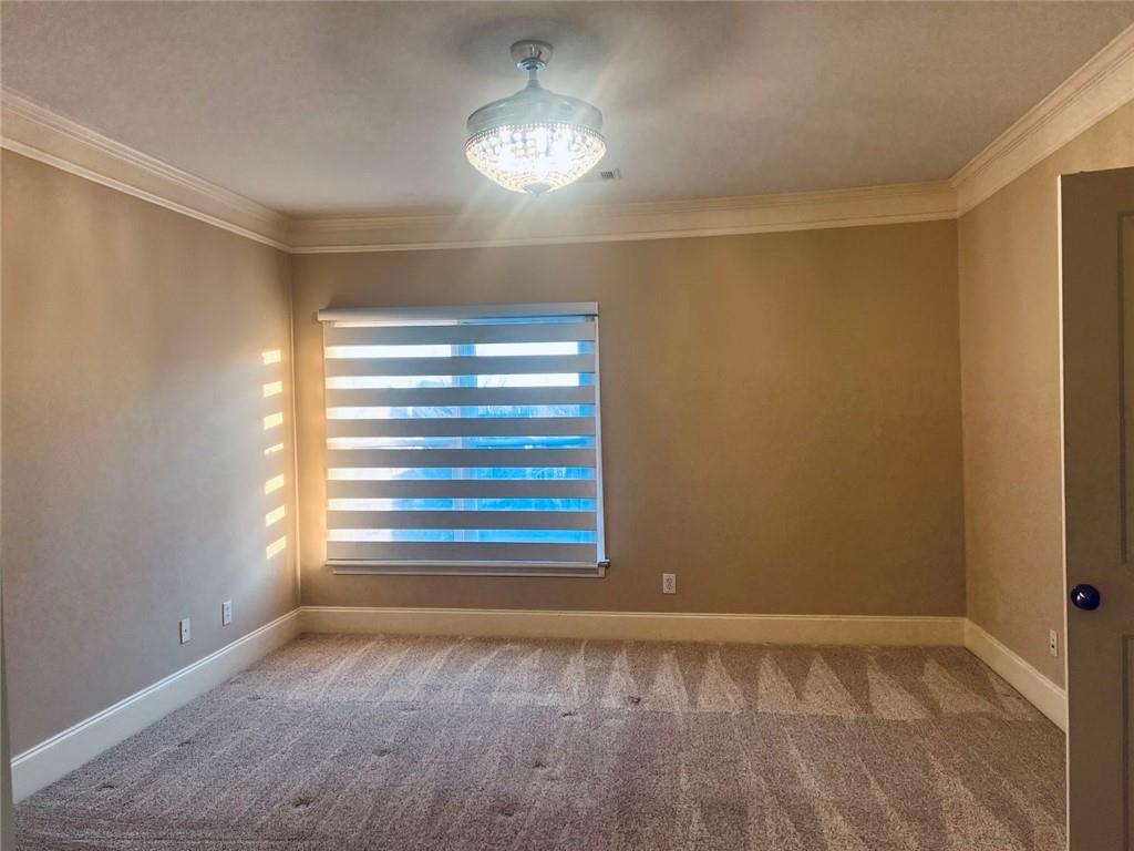 144 West Ridge Way Roswell, GA 30076 - Photo 20 of 30 a view of an empty room with a window