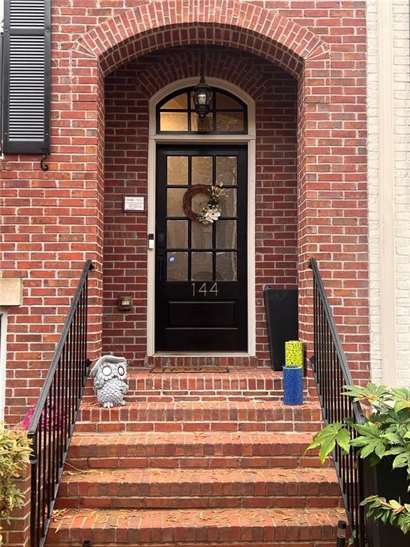 144 West Ridge Way Roswell, GA 30076 - Photo 3 of 30 a view of front door of a house with a window