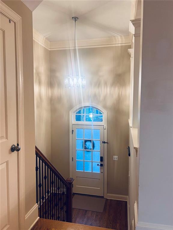 144 West Ridge Way Roswell, GA 30076 - Photo 4 of 30 a view of a hallway with entryway wooden floor and front door