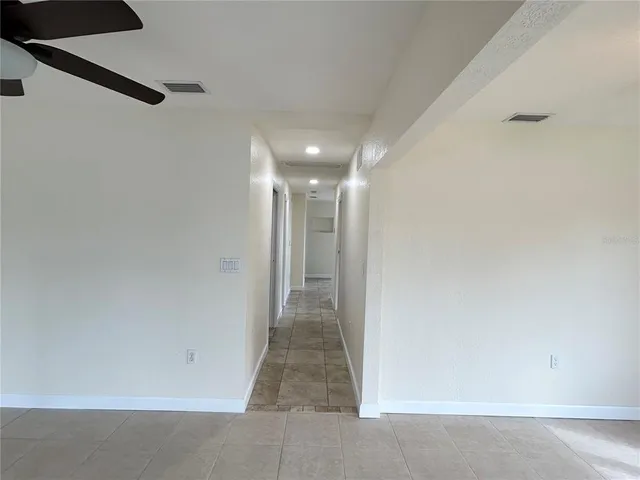 a kitchen with stainless steel appliances granite countertop a stove sink and cabinets