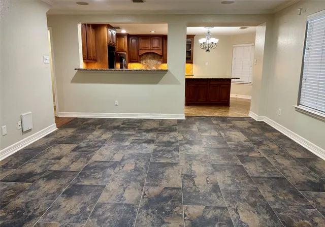 a view of a living room and bathroom