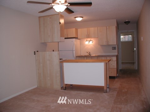 412 Mill Avenue South Renton, WA 98057 - Photo 10 of 13 a view of a kitchen with a sink and dishwasher