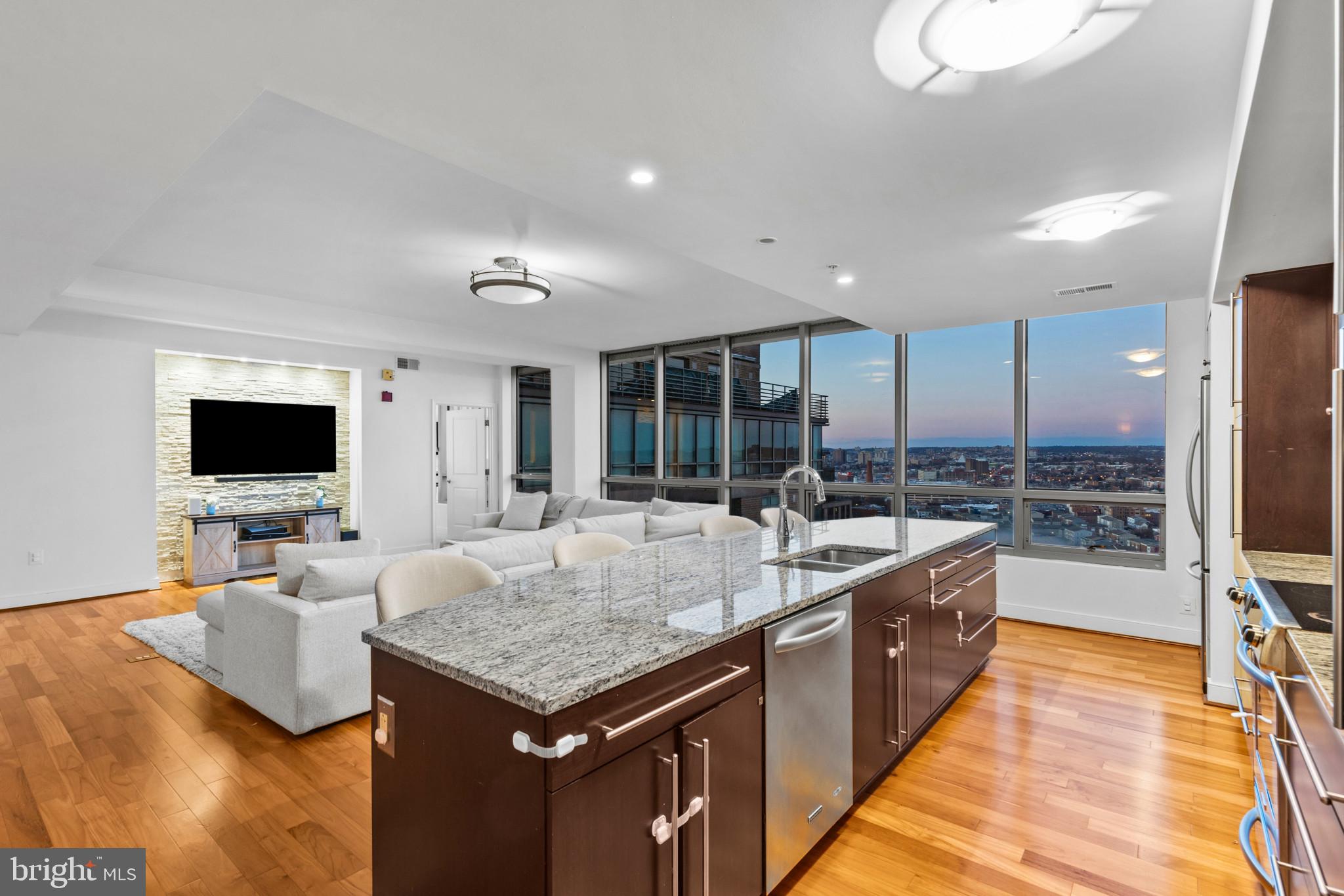 675 President Street, Unit 2706 Baltimore, MD 21202 - Photo 16 of 49 a large kitchen with sink and a large window
