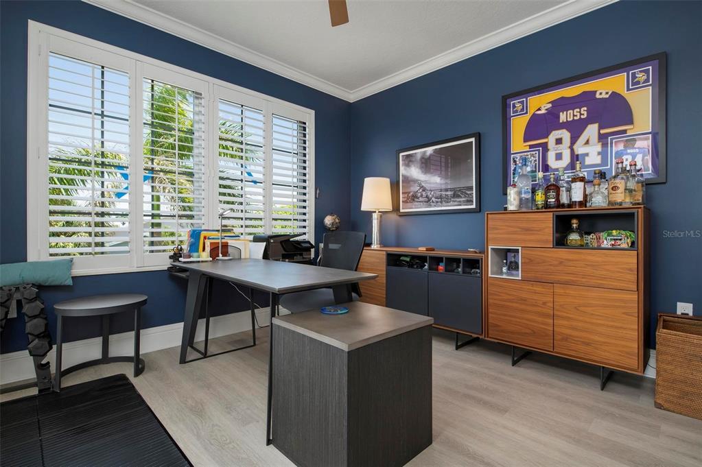 9122 Midnight Pass Road, Unit 34 Sarasota, FL 34242 - Photo 14 of 61 a view of a workspace with furniture and a window