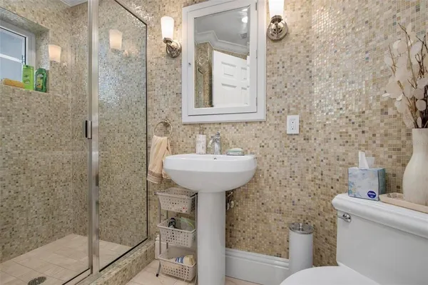 a view of a bathroom with a shower