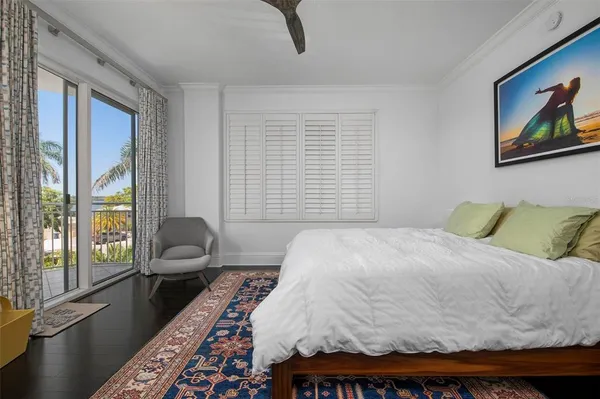 a bathroom with a bathtub sink and mirror
