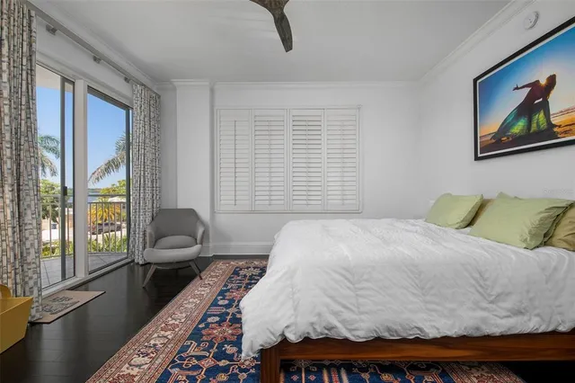 a bathroom with a bathtub sink and mirror