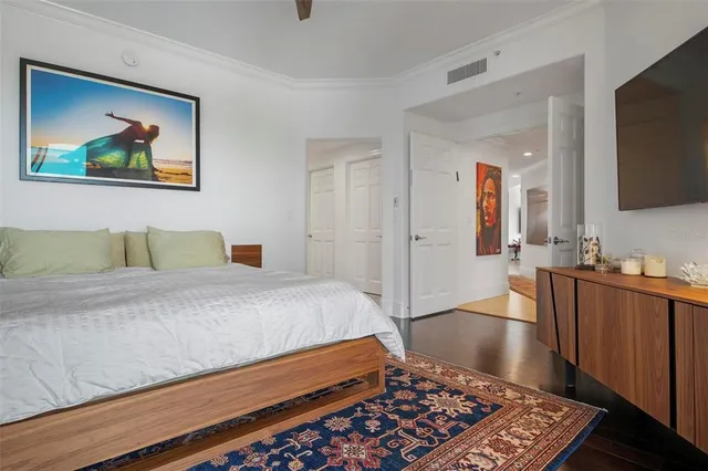 a view of a backyard with plants and a patio