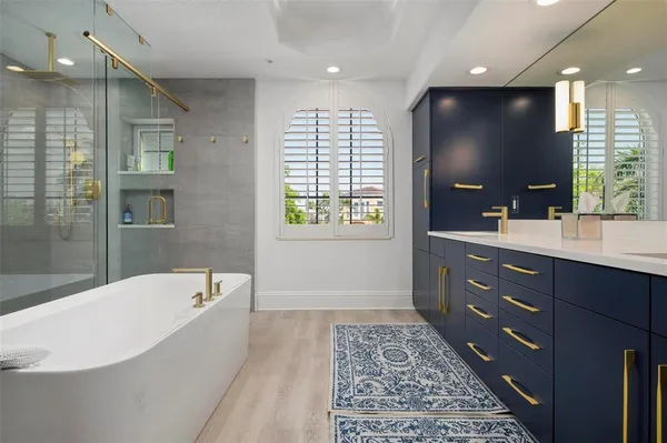 a view of a balcony with two chairs and a table