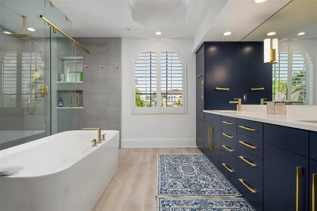 a view of a balcony with two chairs and a table