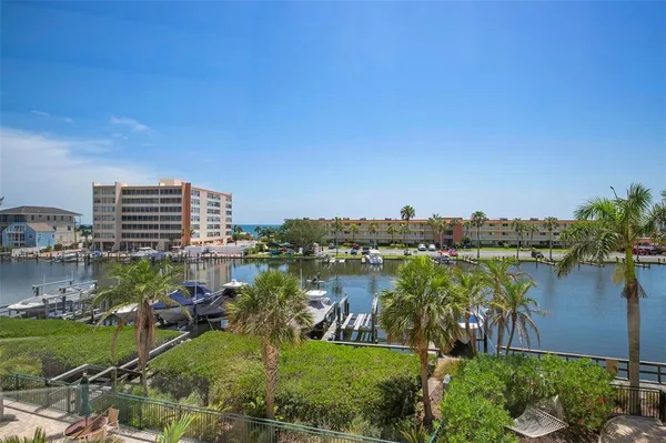 a view of balcony with furniture
