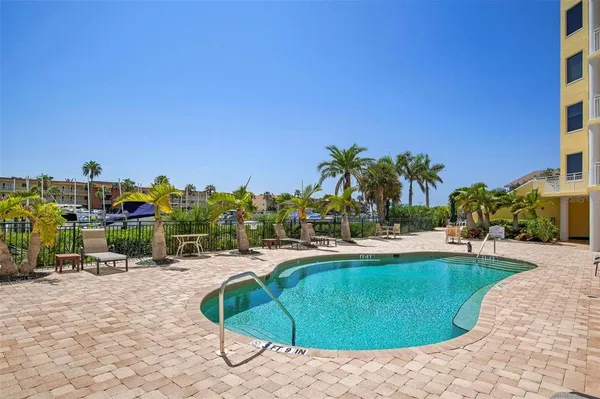 a view of multiple houses with a yard