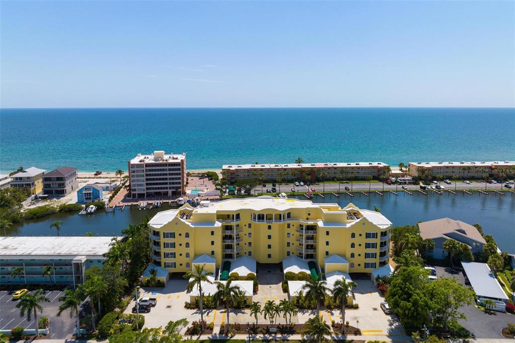 9122 Midnight Pass Road, Unit 34 Sarasota, FL 34242 - Photo 51 of 61 an aerial view of multiple house