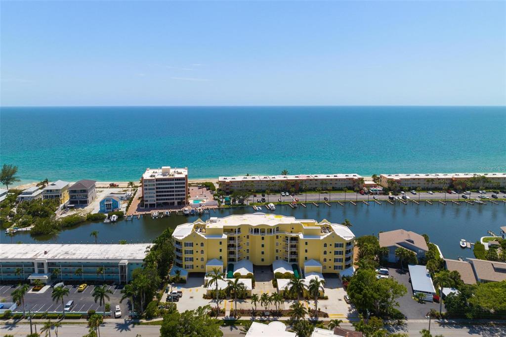 9122 Midnight Pass Road, Unit 34 Sarasota, FL 34242 - Photo 52 of 61 a city view with tall buildings