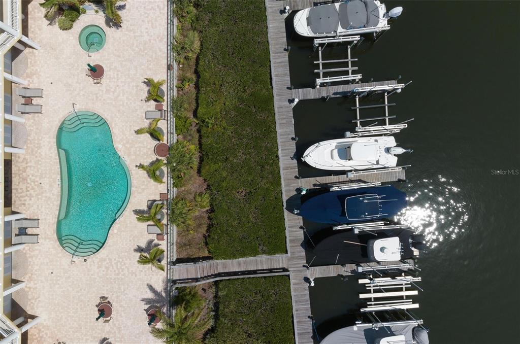 9122 Midnight Pass Road, Unit 34 Sarasota, FL 34242 - Photo 61 of 61 an aerial view of a highlighted house