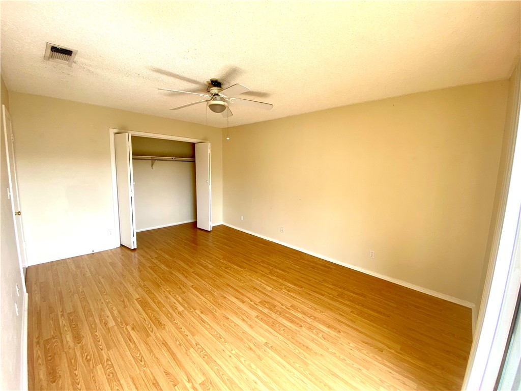 6718 Silvermine Drive, Unit 704 Austin, TX 78736 - Photo 17 of 20 a view of empty room with wooden floor