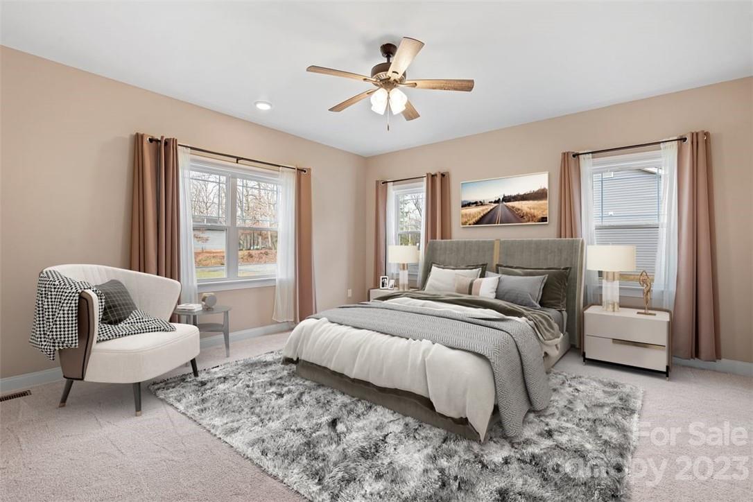 330 Manchester Road Mount Gilead, NC 27306 - Photo 13 of 30 a bedroom with a bed and a couch
