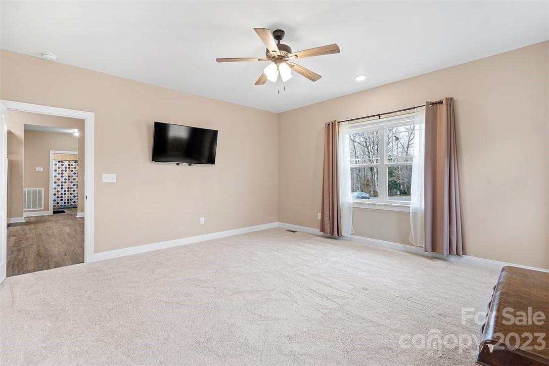 330 Manchester Road Mount Gilead, NC 27306 - Photo 14 of 30 a view of a livingroom with a flat screen tv