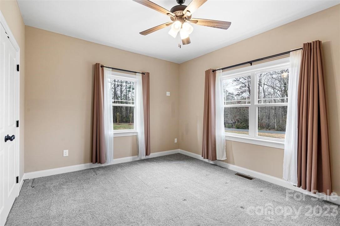 330 Manchester Road Mount Gilead, NC 27306 - Photo 18 of 30 a view of an empty room with a window