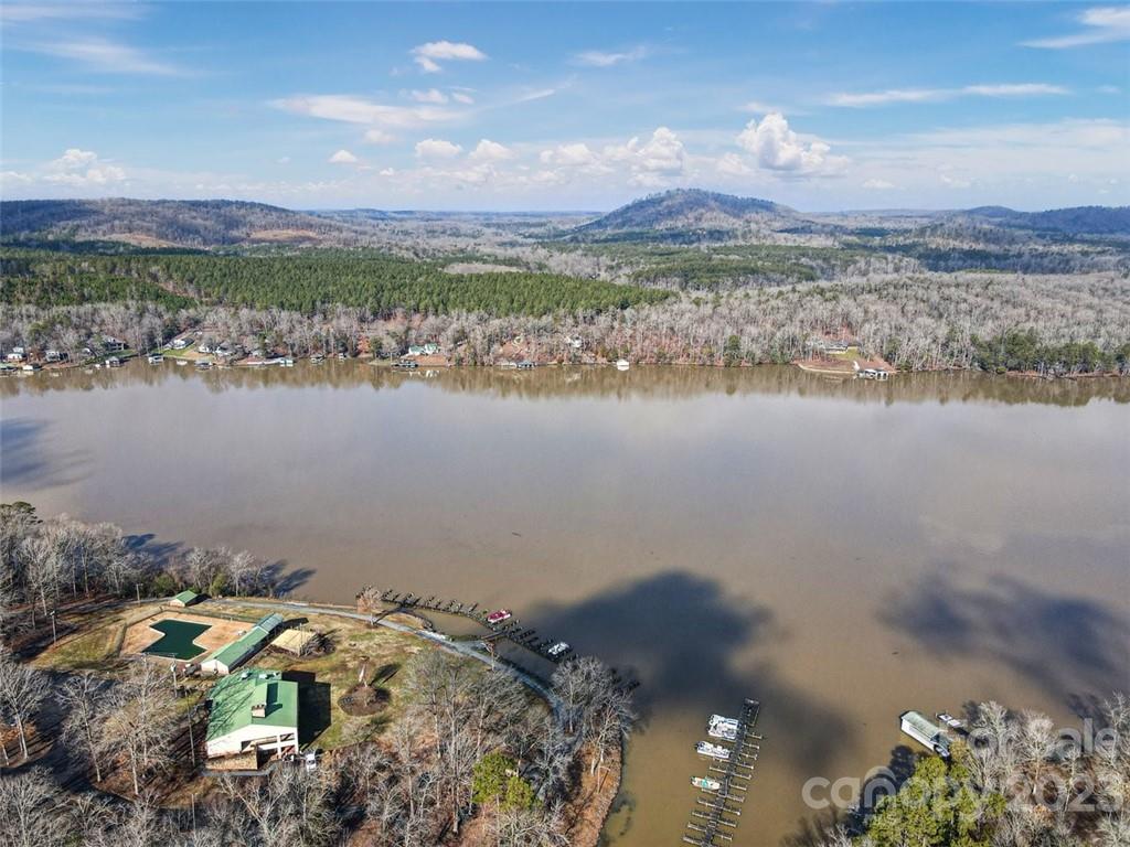 330 Manchester Road Mount Gilead, NC 27306 - Photo 29 of 30 a view of a lake with a mountain