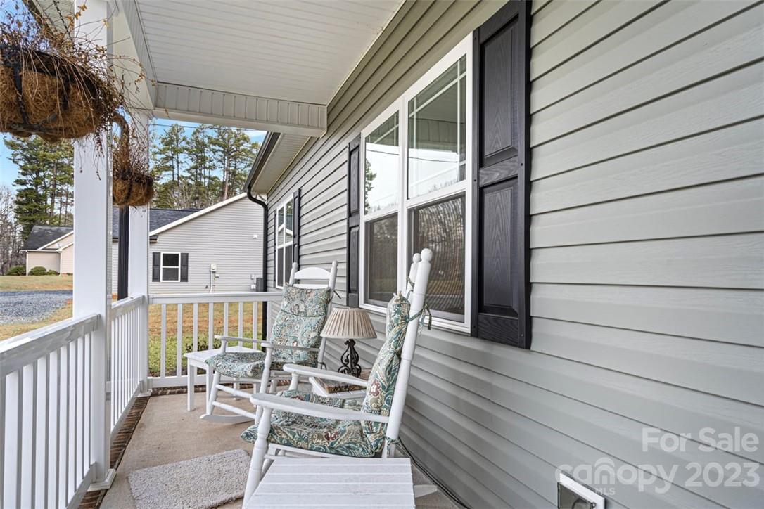 330 Manchester Road Mount Gilead, NC 27306 - Photo 3 of 30 a balcony view with a seating space