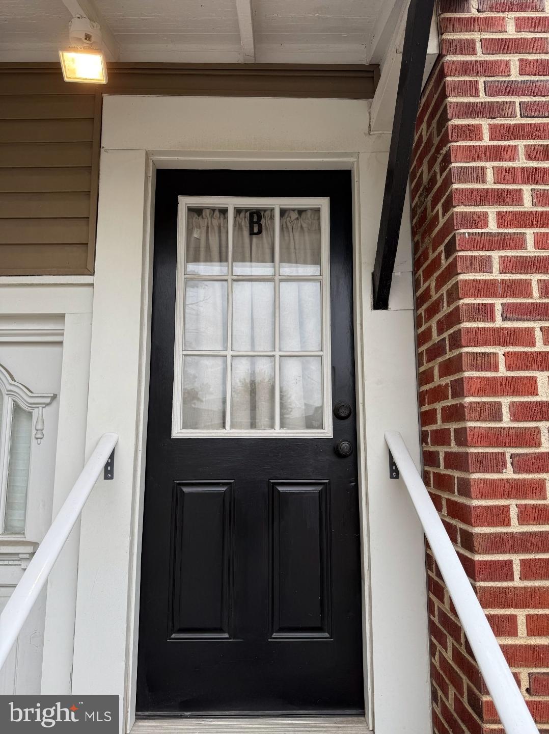 21 East Avenue, Unit B Woodstown, NJ 08098 - Photo 8 of 10 a view of a door and a window