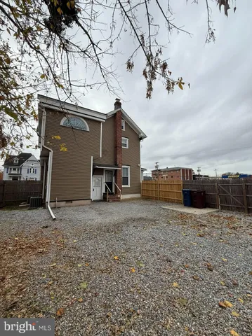 a view of a house with a snow in the yard