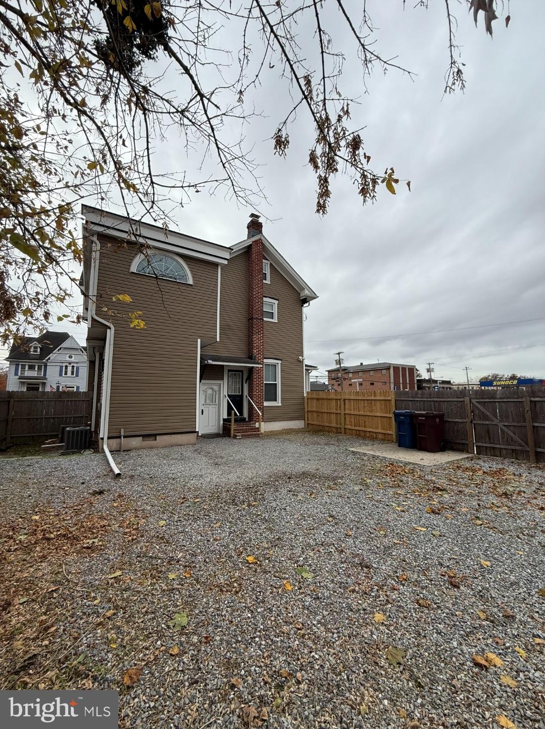 21 East Avenue, Unit B Woodstown, NJ 08098 - Photo 9 of 10 a view of a house with a snow in the yard