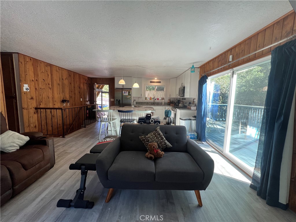 23857 Zuger Drive Crestline, CA 92325 - Photo 11 of 29 a living room with furniture and a large window