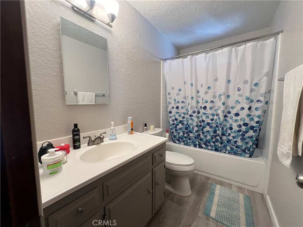23857 Zuger Drive Crestline, CA 92325 - Photo 16 of 29 a bathroom with a sink toilet and shower